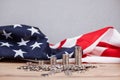 Stack of coins. On the background of the flag of America. The USA is a symbol of the world economy. Capital growth of interest Royalty Free Stock Photo