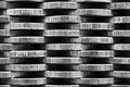 Stack of coins close up. Coin texture. Black and white business background made of many coin edge. Economy finance and bank