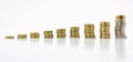 Stack of coins, nine of rows isolated on white background with clipping path without a shadow. Growing and saving money concept.