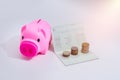 Stack of coins and account book bank on the table Royalty Free Stock Photo