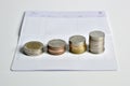 Stack of coins step up on bank saving account book Royalty Free Stock Photo