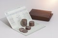 Stack of coins and account book bank on the table Royalty Free Stock Photo