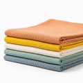 Stack of colored fabrics isolated on white background Royalty Free Stock Photo