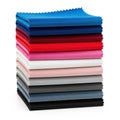 Stack of colored fabrics isolated on white background Royalty Free Stock Photo