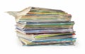 A stack of colored magazines on a white background Royalty Free Stock Photo