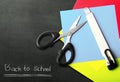 Stack of colored paper with scissors and cutter Royalty Free Stock Photo