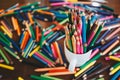 Stack of colored pencils in a glass