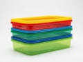 Stack of colored plastic containers isolated on white background Royalty Free Stock Photo