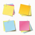 Stack of colored stickers attached metal paper clip with curled corner, ready for your message Royalty Free Stock Photo