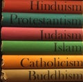 Stack of colorful books on religion