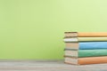 Stack of colorful books on the wooden table. Education background.Back to school. Copy space for text. Royalty Free Stock Photo