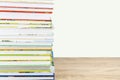 Stack of colorful children books on the table close up with copy space Royalty Free Stock Photo