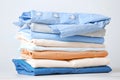 Stack of colorful cotton clothes. Heap of   folded laundry Royalty Free Stock Photo