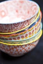 Stack of colorful empty ceramic bowls closeup Royalty Free Stock Photo