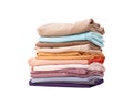 Stack of colorful folded clothes on a white background Royalty Free Stock Photo