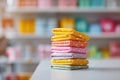 Stack of colorful, folded cloths on a table. Perfect for concepts related to textile design, crafting, organization, or product Royalty Free Stock Photo