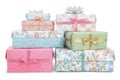 Stack of Colorful Gift Boxes with Floral Patterns and Ribbons for Celebrations Royalty Free Stock Photo