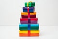 Stack of colorful gift boxes isolated on white background, holiday and celebration concept Royalty Free Stock Photo