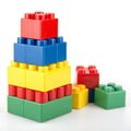 Stack of colorful Lego blocks isolated on white background