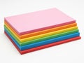 Stack of colorful paper sheets isolated on white background Royalty Free Stock Photo