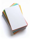 Stack of Colorful Paper Sheets on White Surface in Bright Studio Light Royalty Free Stock Photo
