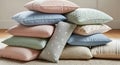Stack of colorful pillows on a beige carpet Royalty Free Stock Photo