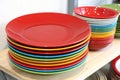 Stack of colorful plates with empty red one Royalty Free Stock Photo