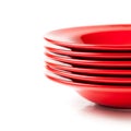 Stack of colorful red ceramics plates Royalty Free Stock Photo