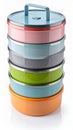 Stack of Colorful Round Lunchboxes with Lids and Handle Isolated on White Backdrop Royalty Free Stock Photo