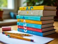 Stack of Colorful School Notebooks and Pencils on Wooden Desk Royalty Free Stock Photo