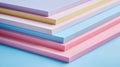 A stack of colorful sheets on a blue background, AI Royalty Free Stock Photo