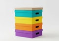 Stack of colorful storage boxes, a practical and decorative solution for organizing items in the home Royalty Free Stock Photo