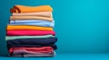 Stack of colorful t shirts with a clean background - Generative AI Royalty Free Stock Photo