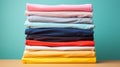 Stack of colorful t shirts with a clean background - Generative AI Royalty Free Stock Photo