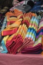 Pile of colorful towels on display by a street vendor in New York City Royalty Free Stock Photo