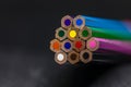 stack of colour pencils beaming trough Royalty Free Stock Photo