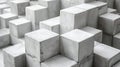 Stack of concrete cubes creating a textured monochrome pattern.