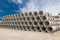 Stack of concrete drainage pipes for wells and water discharges Royalty Free Stock Photo