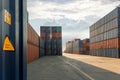 Stack of containers in a harbor. Shipping containers stacked on cargo ship. Background of Stack of Containers at a Port. Royalty Free Stock Photo