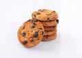 Stack cookies with chocolate on white background