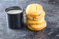 Stack of cookies with milk on dark background Royalty Free Stock Photo