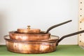 Stack of copper pans Royalty Free Stock Photo