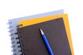 Stack of copybooks with pencil on top Royalty Free Stock Photo