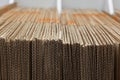 Stack of corrugated cardboard for packaging. Detail of uneven stack of corrugated cardboard sheets. Cross section Royalty Free Stock Photo