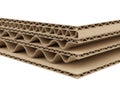 Stack of corrugated cardboard sheets isolated on white background Royalty Free Stock Photo
