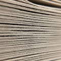 Of a stack of corrugated cardboard sheets, showcasing their layered Royalty Free Stock Photo