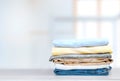 Stack of cotton colorful clothes empty space background Royalty Free Stock Photo