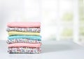 Stack of cotton folded clothes empty space background Royalty Free Stock Photo