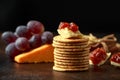 Stack of crackers with apple chutney and other snacks Royalty Free Stock Photo