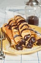 Stack of crepes filled with chocolate hazelnut ganache